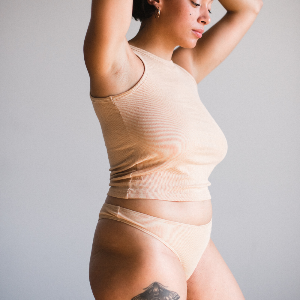 side view of ribbed tencel classic tank in light nude