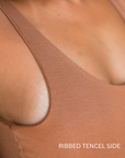 Close up of the ribbed side of the reversible bodysuit