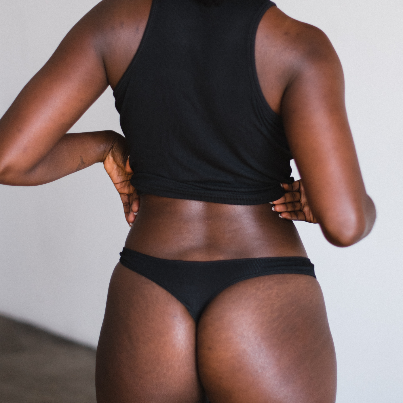 black ribbed tencel thong back view